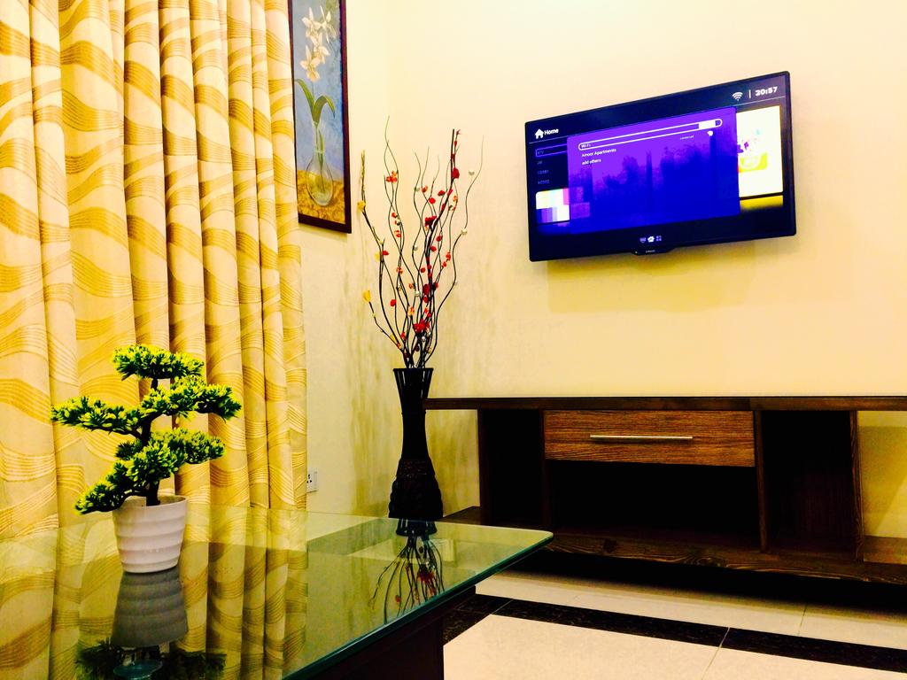Alnoor Luxury Hotel Apartments Lahore TV Area