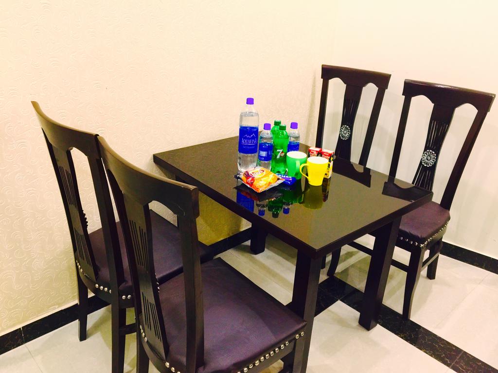 Alnoor Luxury Hotel Apartments Lahore dining table