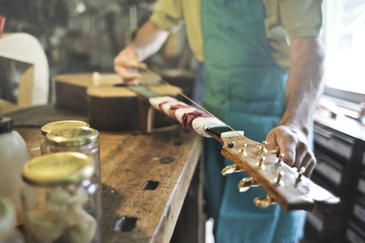 Guitar Tuning reflecting the Six Sigma for Small business improvements