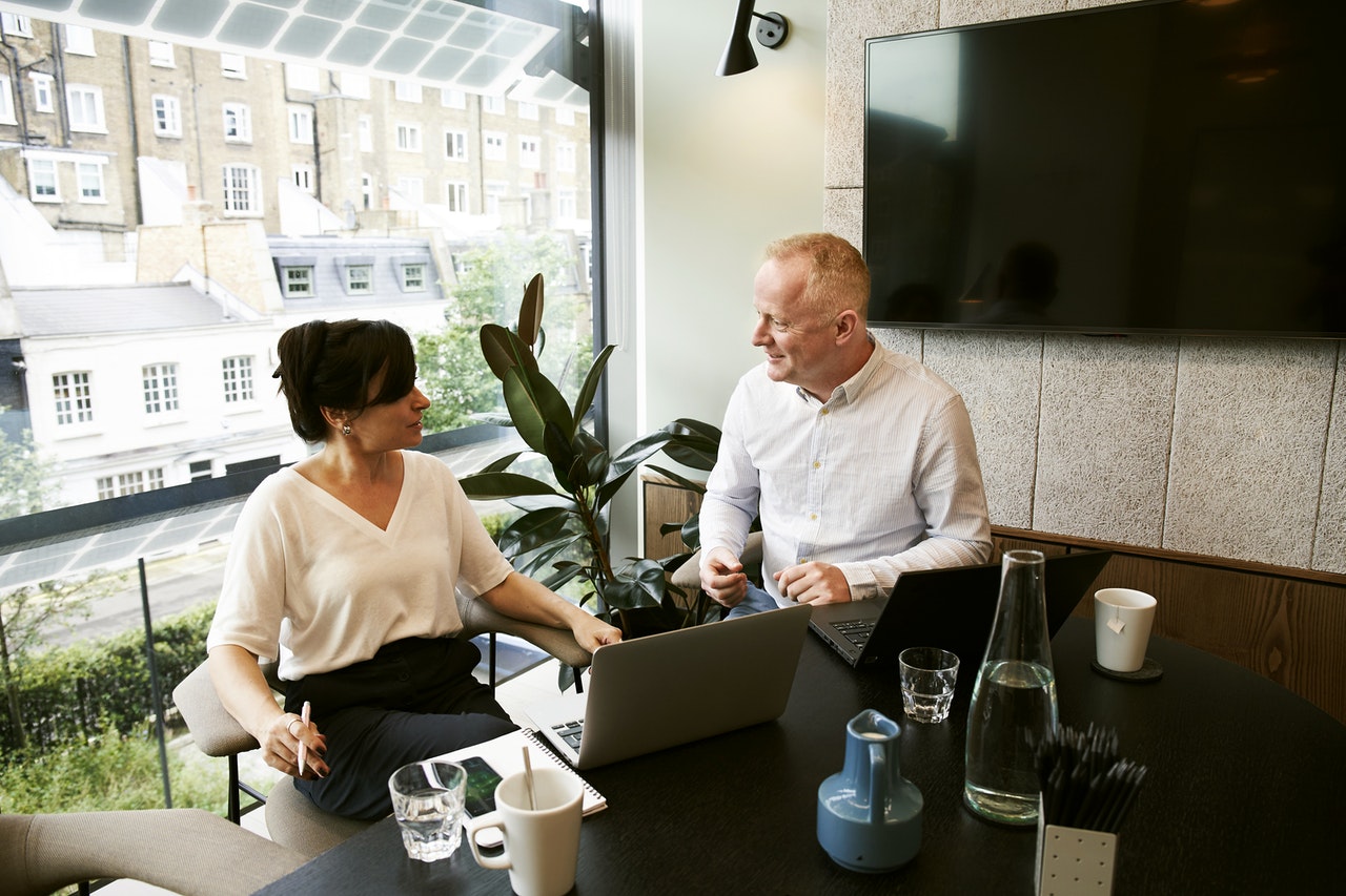 Couple discussing Six Sigma Business Strategy