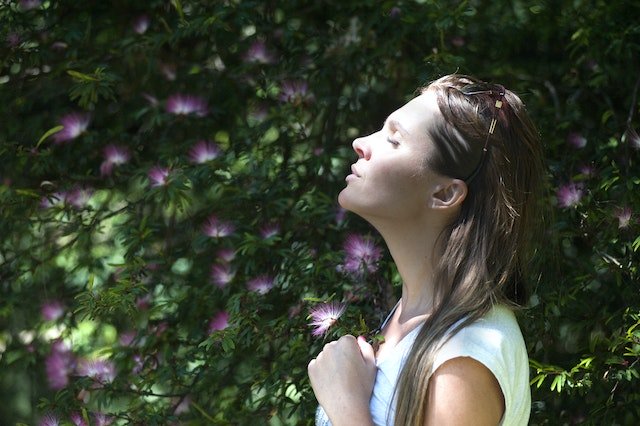 Breathwork in practice by woman